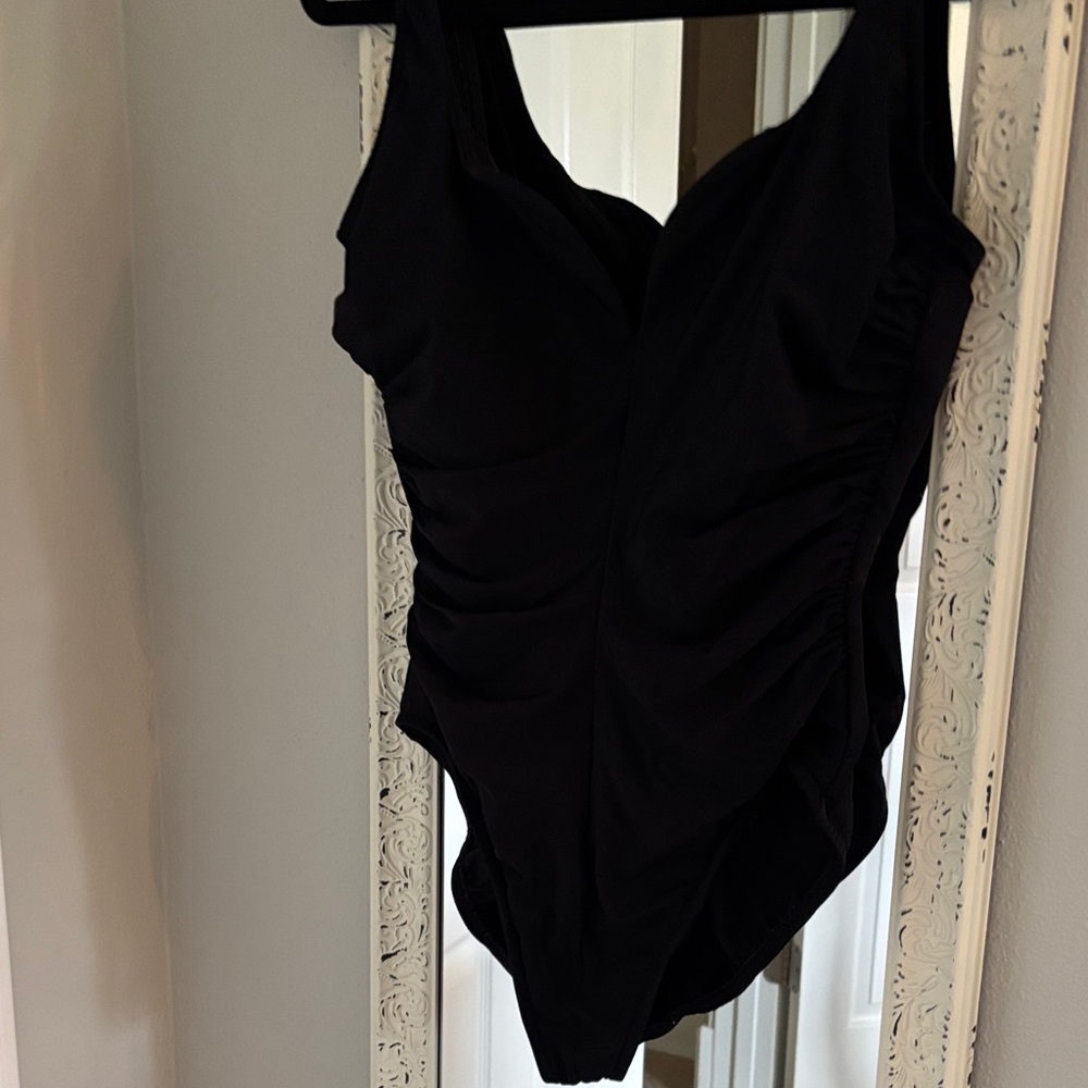 Miraclesuit also skirt and pants.  $ 40
